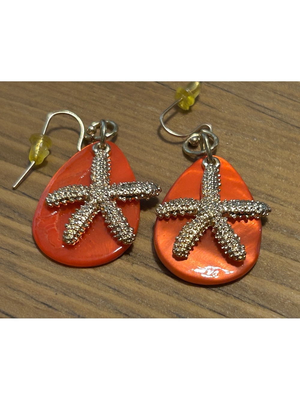 Orange Teardrop Earrings with Silver Starfish Design